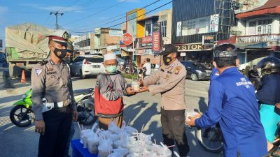 SPI Rohul Bekerjasama dengan Satlantas Polsek Ujung Batu, Berbagi Rezeki di Bulan Suci Ramadan 1442 H