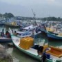 Ket : Kapal nelayan tampak banyak bersandar di dermaga (foto/istimewa)