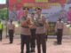 Teks foto : AKBP Hendra Gunawan, S.I.K.,M.T dan AKBP Indra Wijatmiko, S.I.K serta Personil Polres Bengkalis upacara Farewell and Welcome Parade (foto/Indra).