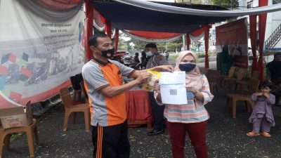 Kasi Humas Pimpin Himbauan dan Cek Kartu Vaksin di Pos Lantas Simpang Pemkab Merangin