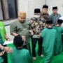 Teks foto : Usai Yasinan dan Do'a bersama, PWNU Riau beri santunan kepada 40 Anak Yatim (Istimewa)