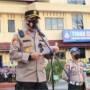 Teks foto : Kapolres Bengkalis AKBP Indra Wijatmiko, S.I.K. sebagi Inspektur upacara Sertijab Waka Polres Bengkalis (Istimewa).