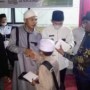 Teks foto ; Ketua PWNU Riau T.Rusli Ahmad,SE,MM dan Bapak Walikota Pekanbaru DR. H. Firdaus,ST,.MT buka puasa bersama Santri Tahfidz Qur'an Asma Alif Al Hikmah (Istimewa).