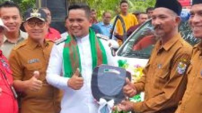 Bupati Pelalawan H. ZUKRI Menyerahkan Ambulans dan Pelayanan kesehatan Di Desa Gondai Dusun Mamahan Jaya