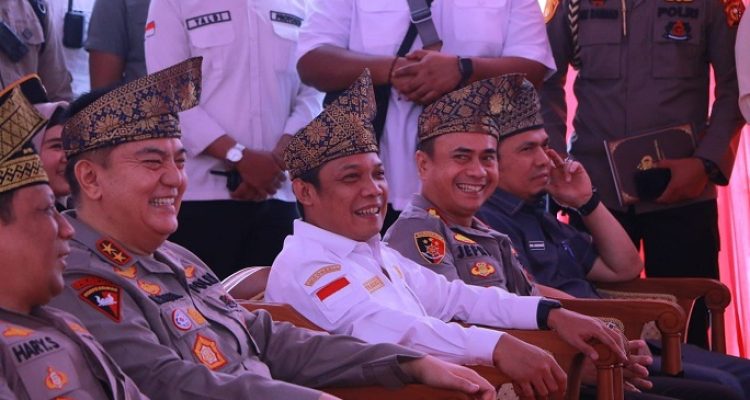Pj Wali Kota Pekanbaru Muflihun mengikuti Apel akbar launching polisi RW Polresta - (ISTIMEWA)