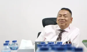 Dr Kapitra Ampera SH, MH.