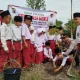 Tanam 45 Pohon di MI Darul Muhajirin, Siswa Didorong Jadi Generasi Peduli Lingkungan