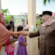 Bupati Kasmarni Tinjau Lokasi Puting Beliung di Bandar Laksamana, Serahkan Bantuan Korban