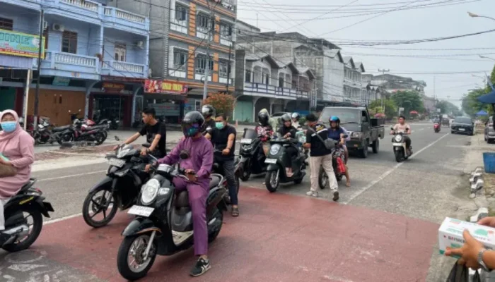 Kabut Asap Mengancam, PWI dan Puskesmas Bengkalis Bagikan 500 Masker